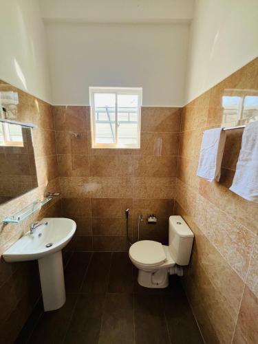 Salle de bains dans l'établissement JO Residence - Tangalle