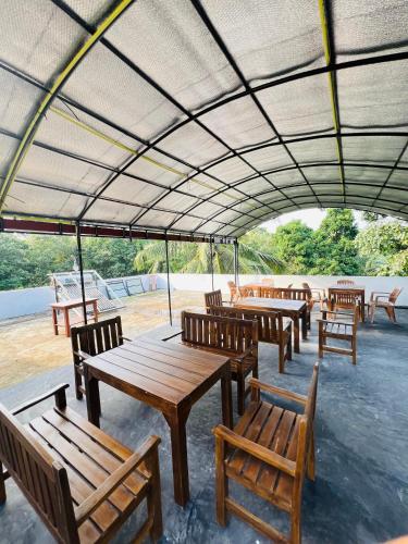 Restaurant ou autre lieu de restauration dans l'établissement JO Residence - Tangalle