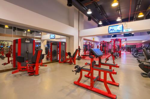 a gym with several treadmills and exercise machines at Crowne Plaza Kayseri by IHG in Kayseri