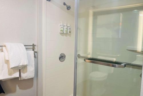 a shower with a glass door in a bathroom at La Quinta by Wyndham Birmingham Homewood in Birmingham