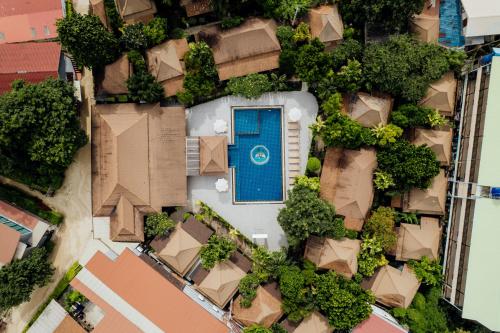 an overhead view of a building with a blue door at Ibiza House Phi Phi in Phi Phi Don