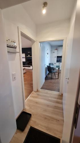 a view of a room with a kitchen and a living room at Ferienwohnung Helfensteinblick in Calden
