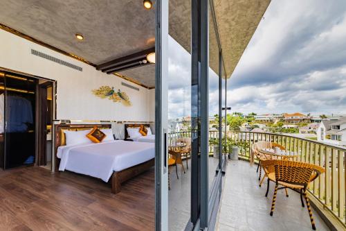 a bedroom with a bed on a balcony at Phuc Hai Hotel Da Lat in Da Lat