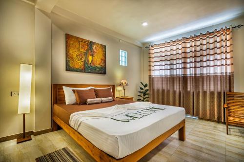 Postel nebo postele na pokoji v ubytování Hiru Hotel