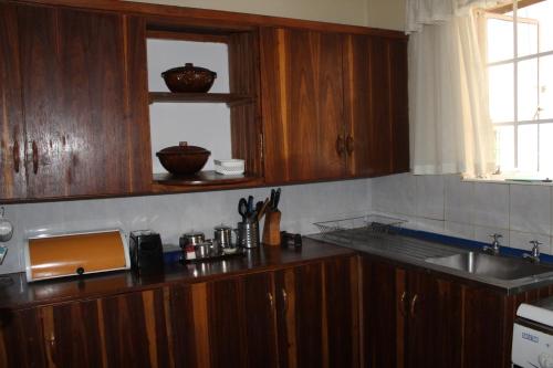 Kuhinja ili čajna kuhinja u objektu Tinotenda Cottage