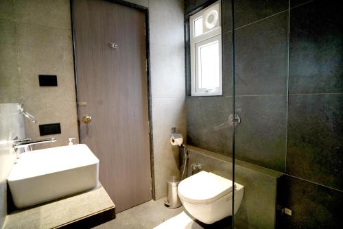 Ένα μπάνιο στο Zip By Spree Hotels Nanded