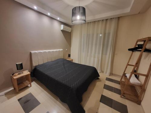 Postel nebo postele na pokoji v ubytování NOUR appartement