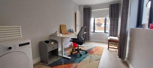 a room with a desk and a computer in it at Burnell in Mullingar