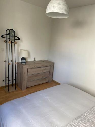 Postel nebo postele na pokoji v ubytování Bel appartement proche gare - WiFi - parking