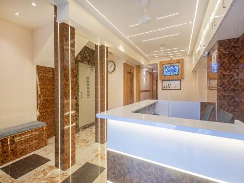 Postel nebo postele na pokoji v ubytování Hotel Al Madina palace