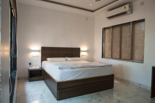 Ένα ή περισσότερα κρεβάτια σε δωμάτιο στο Saminder Beach House