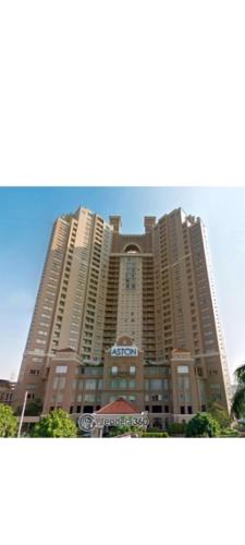 a large apartment building with a large at Ex Hotel Aston Marina Ancol in Jakarta