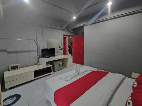 Μια τηλεόραση ή/και κέντρο ψυχαγωγίας στο Madam Inn Patong
