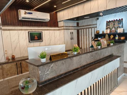 Kuchyň nebo kuchyňský kout v ubytování Hotel M S Pride