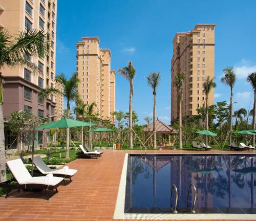 Πισίνα στο ή κοντά στο The Q Hotel & Suite Vientiane 万象Q套房酒店