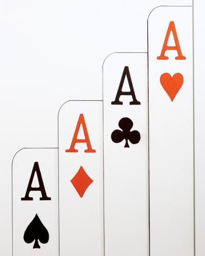 four playing cards with the four acess at O Effe Games Vatican in Rome