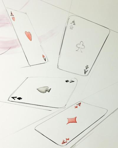a group of playing cards on a table at O Effe Games Vatican in Rome
