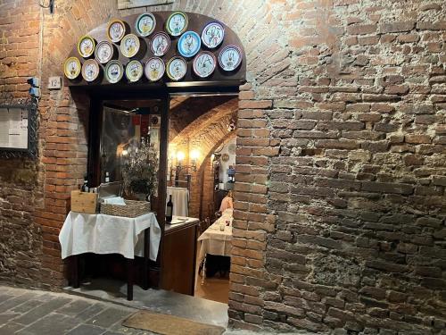 The Rose Suite Sienaにあるレストランまたは飲食店