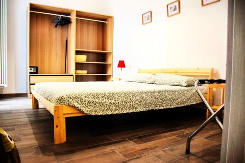 Cama o camas de una habitación en The Sax Appartamenti