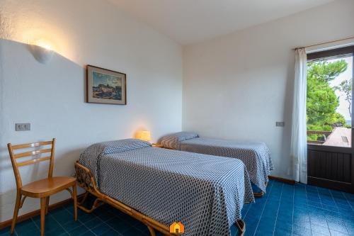 Кровать или кровати в номере Villa Le Sirene on the beach