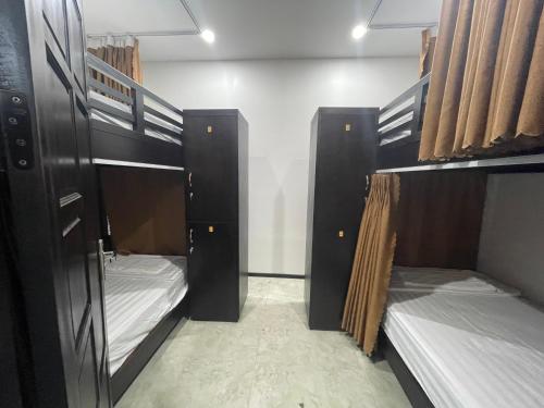Ένα ή περισσότερα κρεβάτια σε δωμάτιο στο MiChoc Homestay - Hostel