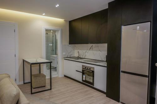 Кухня или мини-кухня в Vollgaapartment2
