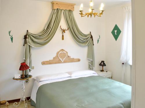 Katil atau katil-katil dalam bilik di Appartamenti Le Mongolfiere