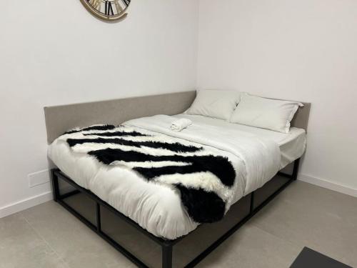 Ένα ή περισσότερα κρεβάτια σε δωμάτιο στο Short Stay 2