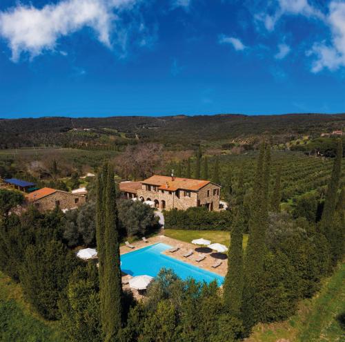 an aerial view of a villa with a swimming pool at Tenuta Il Cicalino in Massa Marittima