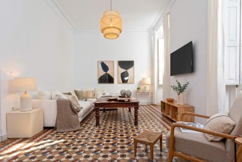 TV a/nebo společenská místnost v ubytování Genteel Home Larios