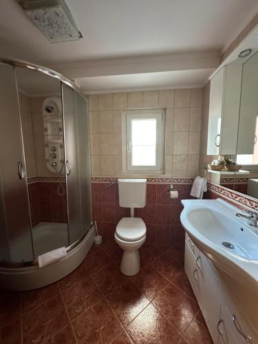 Koupelna v ubytování Hotel Grande