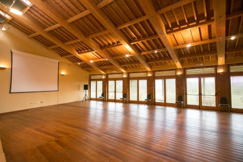a large room with a large whiteboard on the wall at Tenuta Il Cicalino in Massa Marittima