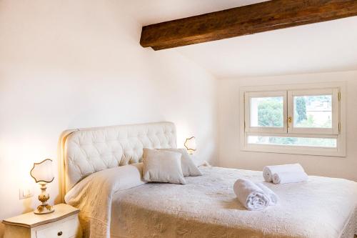 Postel nebo postele na pokoji v ubytování Evaluna Apartments