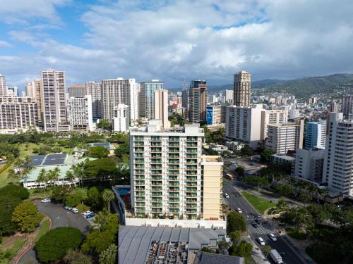 an aerial view of a city with tall buildings at Luana Waikiki Hotel & Suites in Honolulu