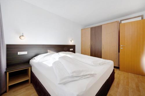 Ένα ή περισσότερα κρεβάτια σε δωμάτιο στο Apartments Antersi Luis