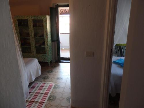 Katil atau katil-katil dalam bilik di Agroturistica Villa Mantineo