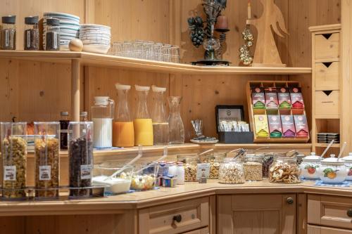 a shelf filled with lots of items on a counter at Haus Gstrein in Obergurgl