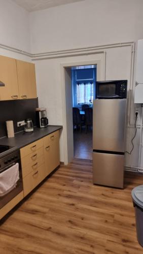 Kuchyň nebo kuchyňský kout v ubytování Monteurwohnung 1 Bitterfeld
