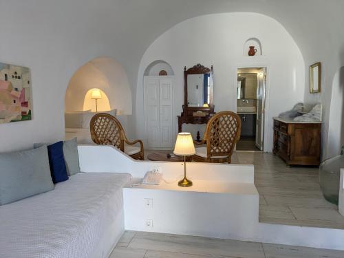 Una cama o camas en una habitación de Heliotopos