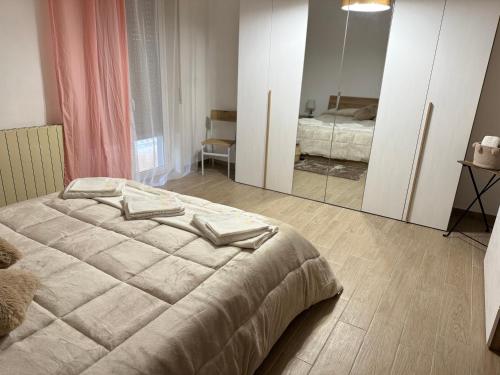 Ένα ή περισσότερα κρεβάτια σε δωμάτιο στο Casa Sole Sofiè