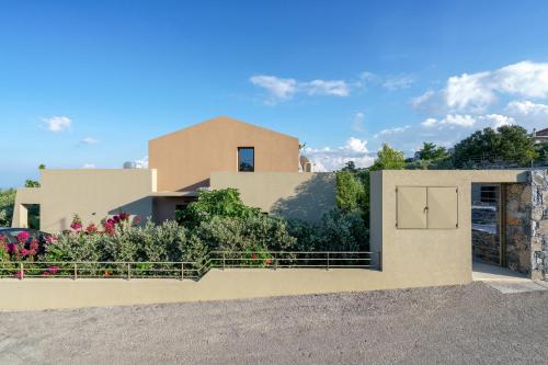 a view of a house from the driveway at Olimpia Villas I Luxury villas with private pools! in Epáno Kefalás