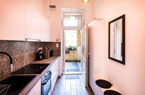 Kuchyňa alebo kuchynka v ubytovaní BpR Szondi Cozy Apartment