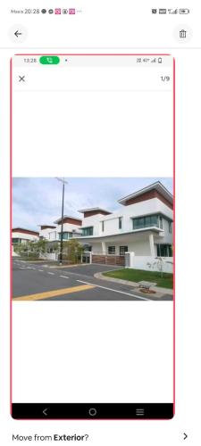 a page of a website with a picture of a building at Lumut Marina in Lumut