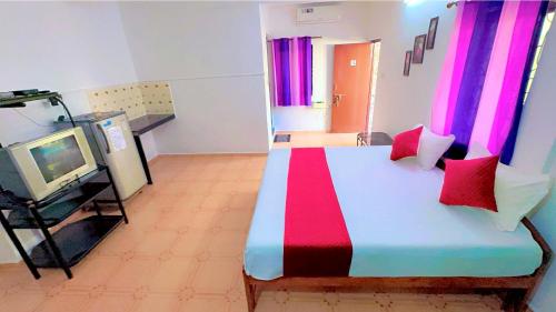 TV a/nebo společenská místnost v ubytování Deepti Guest House