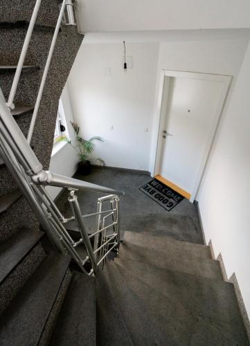 a stairway leading to a door in a building at Domus Optima - Cozy Retreat in Vienna in Vienna