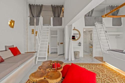a living room with a couch and a table at Blue Mountain Guesthouse by Seablue in Arachova
