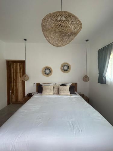 Ein Bett oder Betten in einem Zimmer der Unterkunft Villa Felizzy