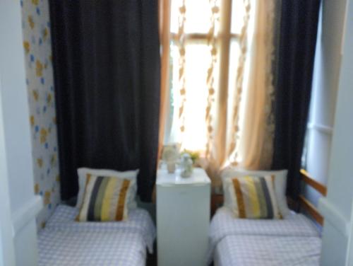 Ένα ή περισσότερα κρεβάτια σε δωμάτιο στο Quarto C