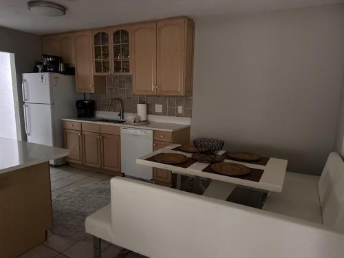 a kitchen with a table with cookies on it at Siesta Key Bay View Beach Access in Siesta Key