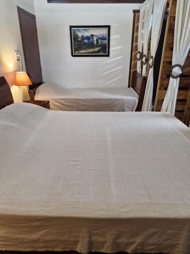 ZarZo Suites in Central Aizawlにあるベッド